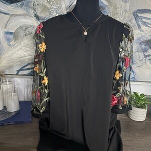 Elegant Black dress with Vibrant Floral Sleeves